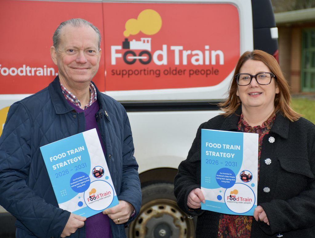 Food Train Chief Executive Rosie McLuskie and vice-chair Bruce Hedley with the charity’s new five-year strategic plan.