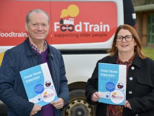 Food Train Chief Executive Rosie McLuskie and vice-chair Bruce Hedley with the charity’s new five-year strategic plan.