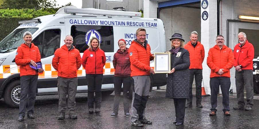 The Lord Lieutenant of Wigtown, Aileen Brewis presents the Queen's Award for Voluntary Service to Galloway Mountain Rescue.