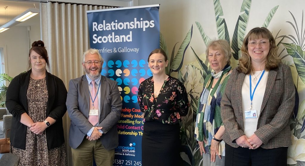 Natalie Don MSP, centre, visits the RSDG team.