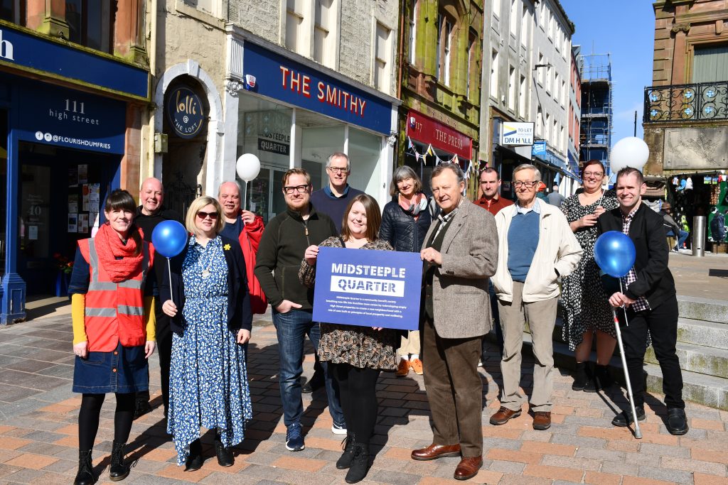 Members and supporters of Midsteeple Quarter Community Benefit Society gathered in Dumfries High Street on Saturday April 8th 2023 to mark the organisation's fifth birthday. Picture: Midsteeple Quarter