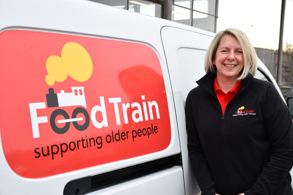 • Food Train chief executive Michelle Carruthers with one of the charity’s vans.