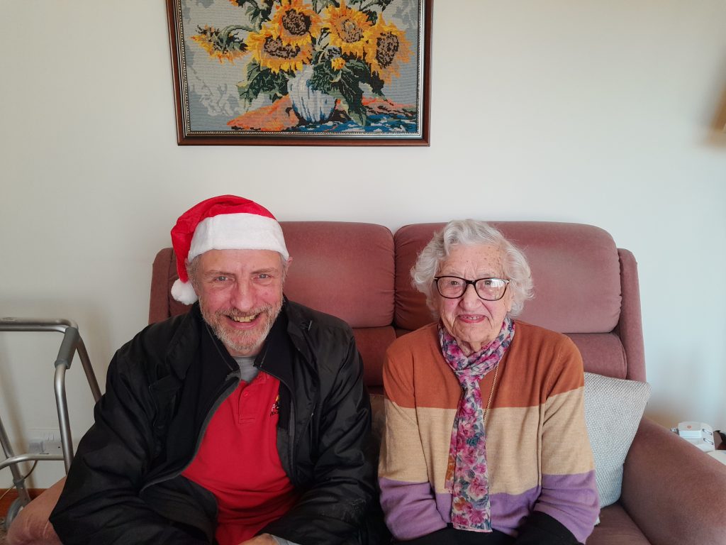 Food Train customer Loreta Lockwood, aged 102, of Dumfries with Ian Gilbert, a volunteer with the charity.
