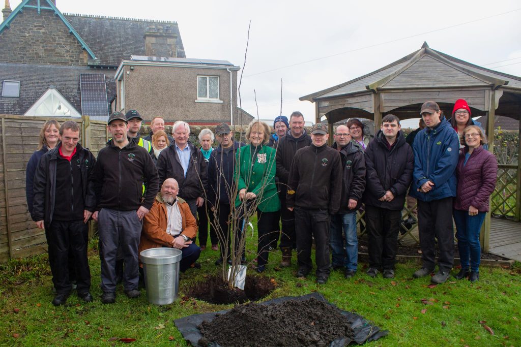 The Potters Garden team plant their tree.